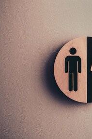 Gender role representation: restroom signs featuring both men and women