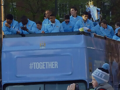 The Manchester City team on their victory parade following their Premier League title win 2012