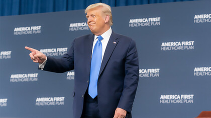 President Donald J. Trump acknowledges an audience member after delivering remarks on the America First Healthcare Plan, USA