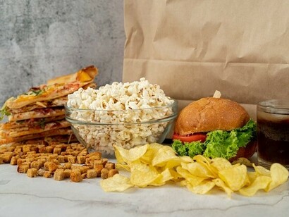 Processed fast foods like burgers, popcorn, chips, and pizza contribute to obesity and rising health costs