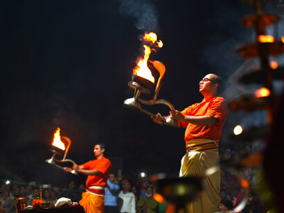 Sacred sounds echoing during the sunset Ganga Aarti ceremony on the banks of the Ganges in Varanasi, India