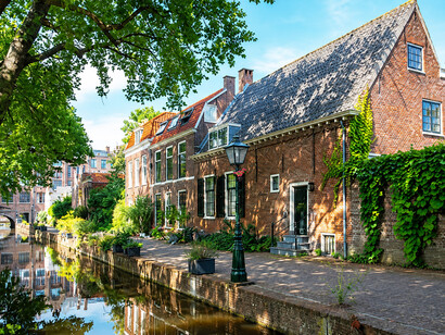 Historic grachten and peaceful canals weave through the city of Leiden in the Netherlands