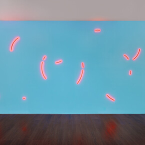 Stephen Antonakos, Ruby neon incomplete circles on a light blue wall, 1977. Courtesy of Bookstein Projects
