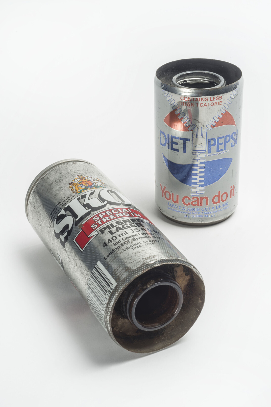 Narcotics: Drinks cans used in drug smuggling, seized by Metropolitan Police © Museum of London