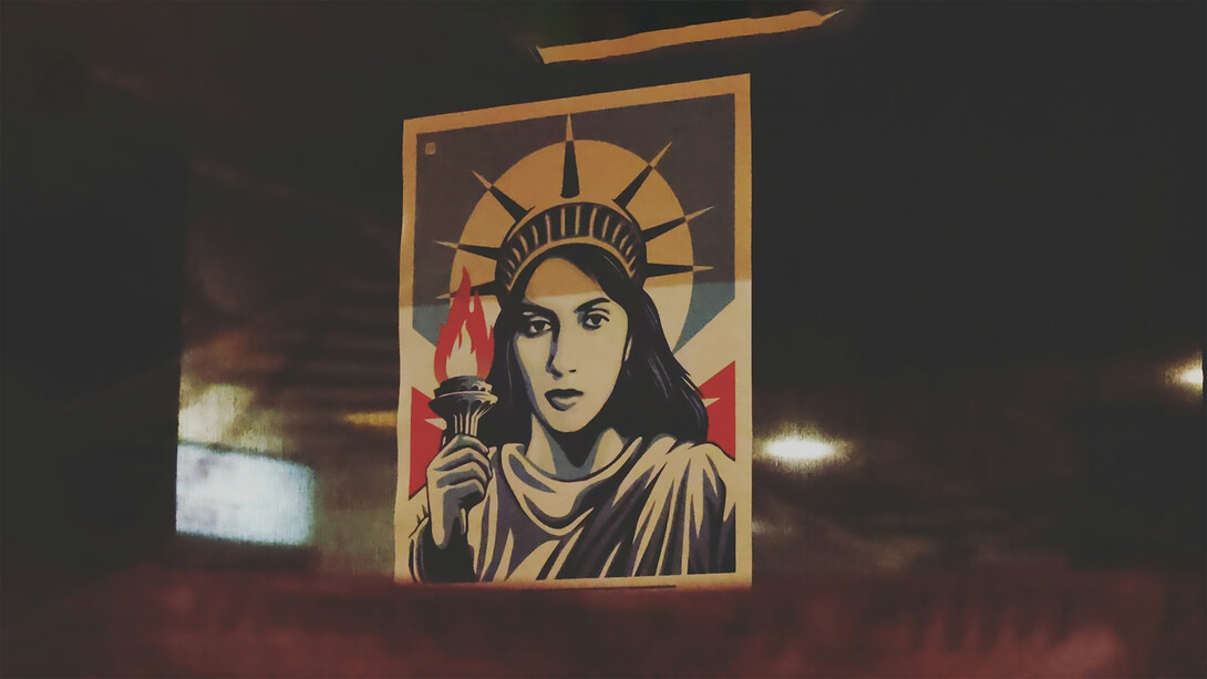 An illustration of a woman holding a torch, symbolizing freedom and empowerment, similar to the Statue of Liberty