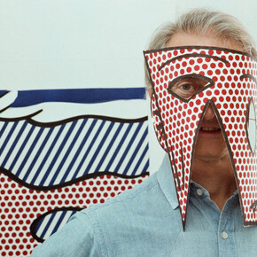 Roy Lichtenstein wearing a mask cut out from
one of his proofs for the Paintings Series (detail), 1983, Sidney B. Felsen (American, b. 1924)
Archival inkjet print from negative
Getty Research Institute, Los Angeles, 2019.R.41.  
Gift of Jack Shear. Art © Estate of Roy Lichtenstein.  
Photo © J. Paul Getty Trust