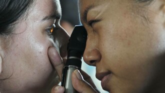 A doctor examining a patient thoroughly leaving no stone unturned