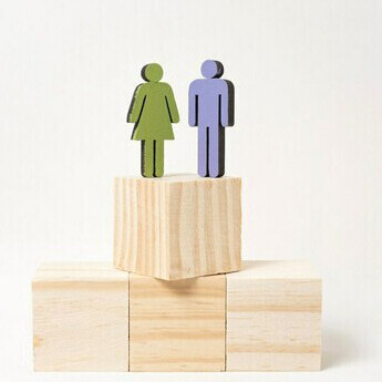 Woman and man standing on the same height