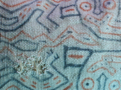 Textiles in early andean civilization. Courtesy of Museo Chileno de Arte Precolombino