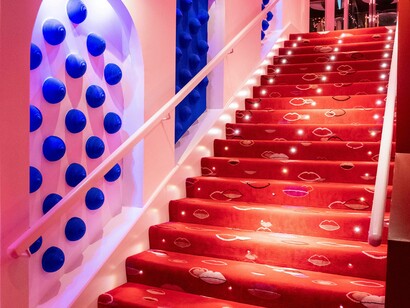 Steps leading up to the entrance of the Crazy Horse in Paris, France