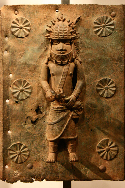 A brass plaque—often misidentified as bronze—from the historic Kingdom of Benin in present-day Nigeria. Currently part of the British Museum collection in London,UK