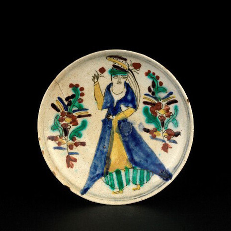 Kalfayan Collection, Kutahya type dish depicting dressed female figure, 18th c. Photographer Thanos Kartsoglou
