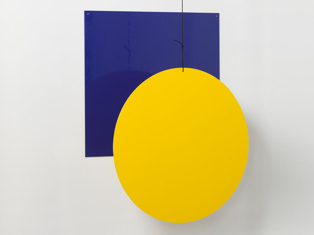 Camilla Løw, Vertical Sun, 2014, Hand painted in enamel on aluminium & cord, 63 cm x variable height