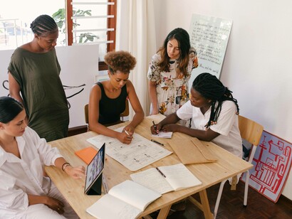 A group of women outlining they path towards success