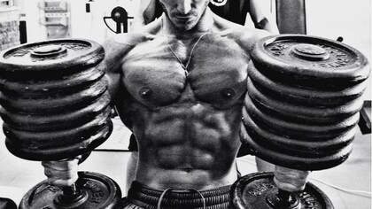 Before an international competition, Francesco is preparing to perform chest bench-presses with 62kg weights