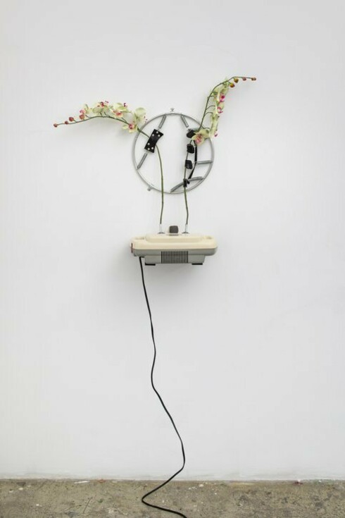 Rachel Youn, Voluptuous Panic, 2022. Shiatsu massager, artificial flowers, hand grip exerciser, 33 x 24 x 12 in. Courtesy of Sargent's Daughters Gallery