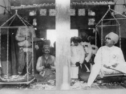 The Maharaja of Bikaner is being balanced with gold on the occasion of his 50th government anniversary, Photograph, Around 1930 (Photo by Imagno/Getty Images)