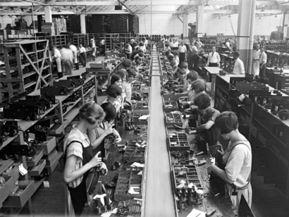 Women working in a factory in the early 20th century