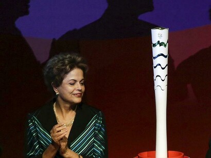 Presidenta Dilma Rousseff com a tocha olímpica