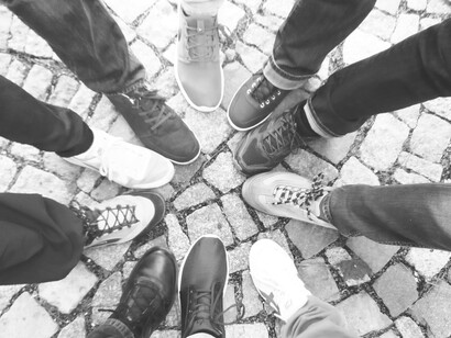 People forming a circle. In human beings, ideas determine their actions