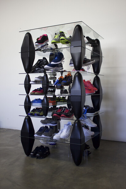 Patrick Jackson, Shelving Unit, 2015, Glass, shoes, plastic, 36 x 67 ½ x 36 in. Courtesy Galerie GP & N Vallois, Paris