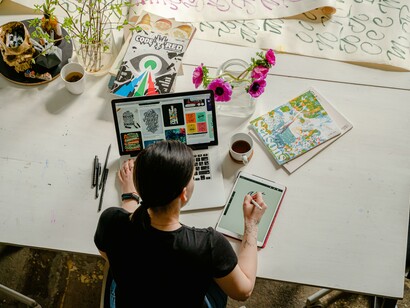 A person creating digital art