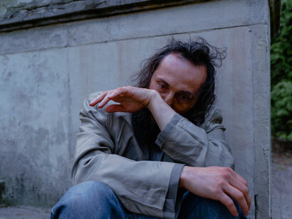 This homeless man stands as a powerful symbol of systemic failure, while the world produces enough to ensure everyone’s dignity, economic and political structures leave many without basic necessities