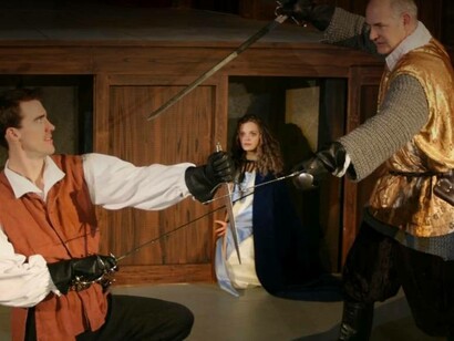 Theodore dueling with the villain Manfred's allies in a scene from the Castle of Otranto 