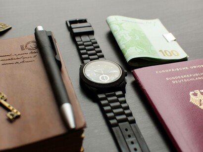 A passport, money, a journal and a watch to survive overseas