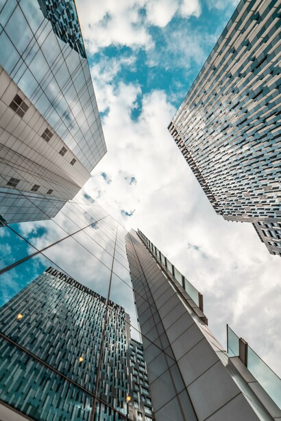 A view from below modern buildings in a city 