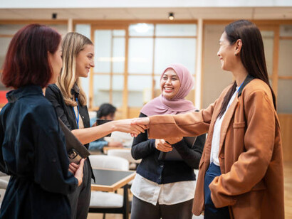 Businesswomen engage in a bilateral meeting reflecting principles of classical diplomacy