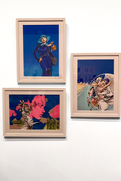 Three artworks from “Art of Manga” at the de Young Museum in San Francisco, featuring colored illustrations by Hirohiko Araki from JoJo’s Bizarre Adventure: including a character wearing fashion items from a collaboration with Gucci; a promotional image of Rohan Kishibe for the manga chapter Rohan at the Louvre; and artwork depicting characters from JoJolion. Photo: © İdil Burkutoğlu