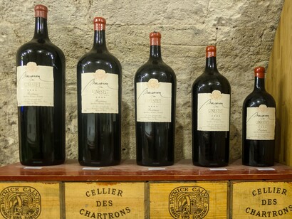 Rows of wine bottles stored in the cellar