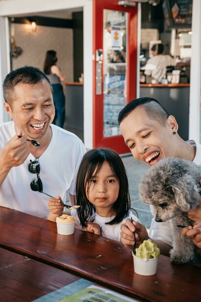 A joyful family sharing ice cream on a sunny day