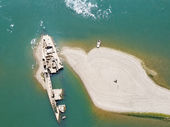 Twenty World War II shipwrecks emerge from the Danube in Serbia as water levels fall dramatically