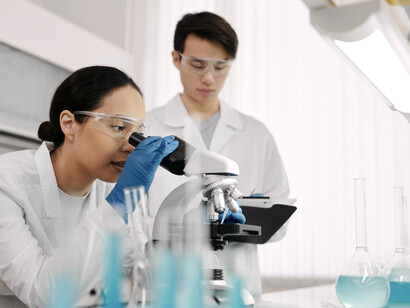 Two scientists recorded their findings after looking at water in their laboratory 