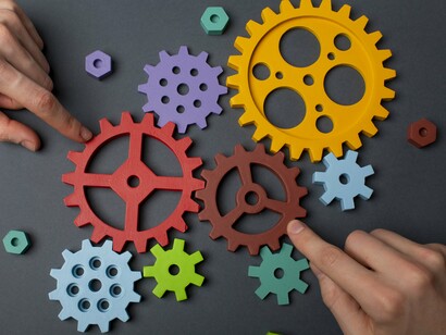 The careful placement of each gear underscores the importance of fair labor policies and competitive wages in creating a well-functioning labor market where both workers and employers can thrive