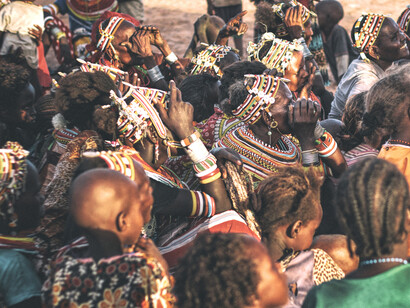 The villagers of Kargi, a remote town in eastern Kenya gather together