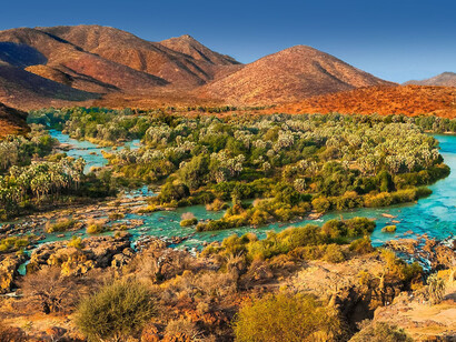 The landscape of the Kunene River in the north of Namibia extends for 325km on the country’s border with Angola. The river meanders along the surrounding landscape, attracting a plethora of wildlife to its varied banks