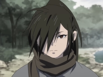 Hyakkimaru framed by muted forests and grey skies, symbolising the pain and perseverance woven into Dororo’s story