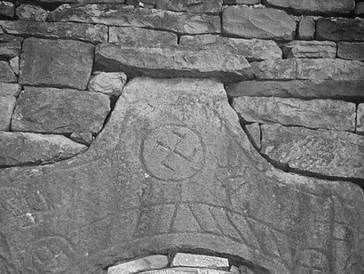 Swastika on the medieval tower arche in Khimoy, Chechnya