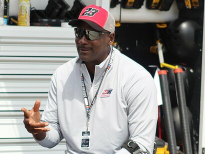 Michael Jordan’s image performs what his brand demands: visibility without controversy, presence without protest