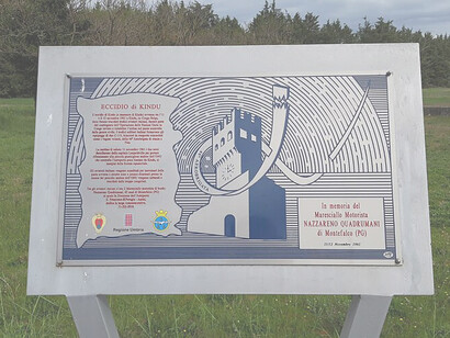 Targa commemorativa posta all'ingresso dell'aeroporto di Perugia-Sant'Egidio, Italia, in ricordo del maresciallo motorista Quadrumani e degli equipaggi assassinati a Kindu nel novembre del 1961