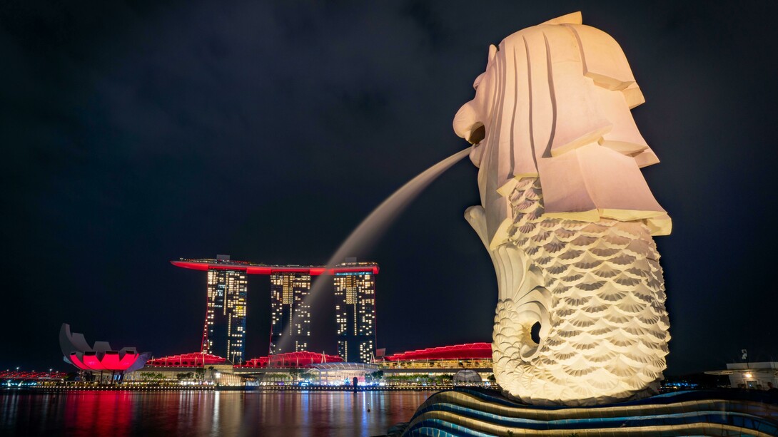 A nighttime view of Singapore’s tall buildings and urban landscape
