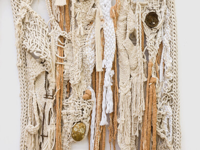 Tanya Aguiñiga, Somos una tela continua (detail), 2023. Found objects from the LA River, low-fired terracotta, stones from the LA river, cotton dyed with terracotta, and cotton rope, 96 x 105 x 12 in (243.8 x 266.7 x 30.5 cm). Courtesy of Shulamit Nazarian LA