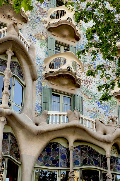 Barcelona, Spain, Casa Batlló, redesigned by Antoni Gaudí in 1904, showcases the organic forms and vibrant details that define his architectural genius