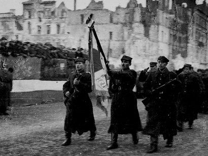 Parade of the First Polish Army marching along Marszałkowska Street in the aftermath of World War II, celebrating the city’s liberation and rebirth, Warsaw, Poland