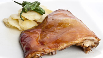 Plato de cochinillo asado