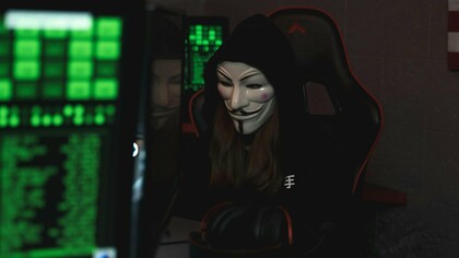 The Anonymous mask often associated with the hacker, showing how the digital age has blurred the lines between activism and cyberextremism