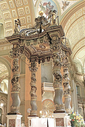 St. Peter's Basilica in Rome, under its dome is a copy of Bernini's baldachin